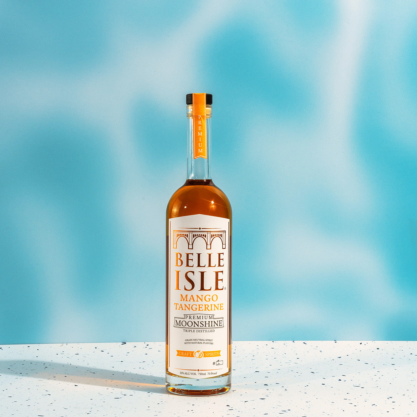 https://ship.belleislecraftspirits.com/cdn/shop/products/BICS-MangoTangerine-18-edit-sq_1600x.jpg?v=1678722173